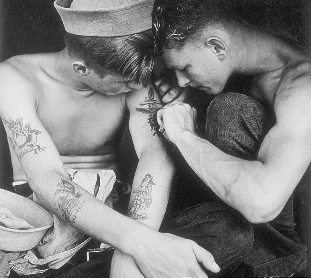 A sailor being tattooed by a shipmate aboard the USS New Jersey. Source: MPI/Getty Images 